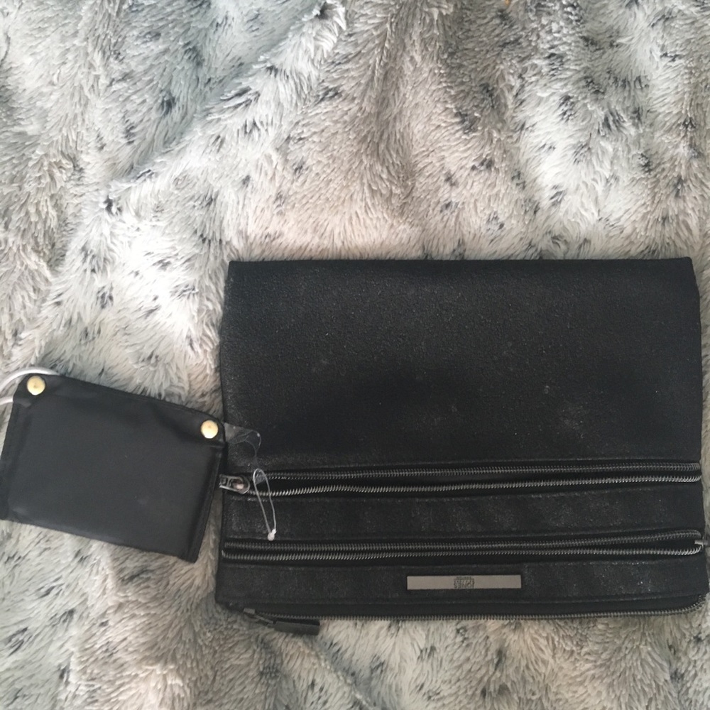 Jones New York clutch with recharging capability